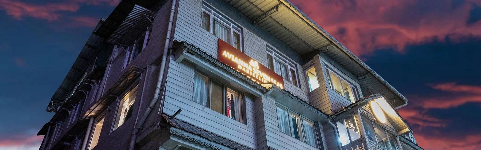 An image of a two storey building which also shows an evening sky in the background - Avianna Group of Hotels & Resorts