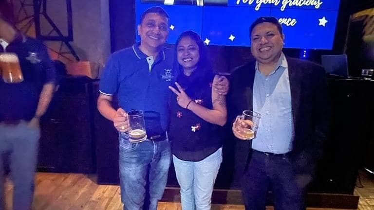 Employees of Polo towers posing during an event 9