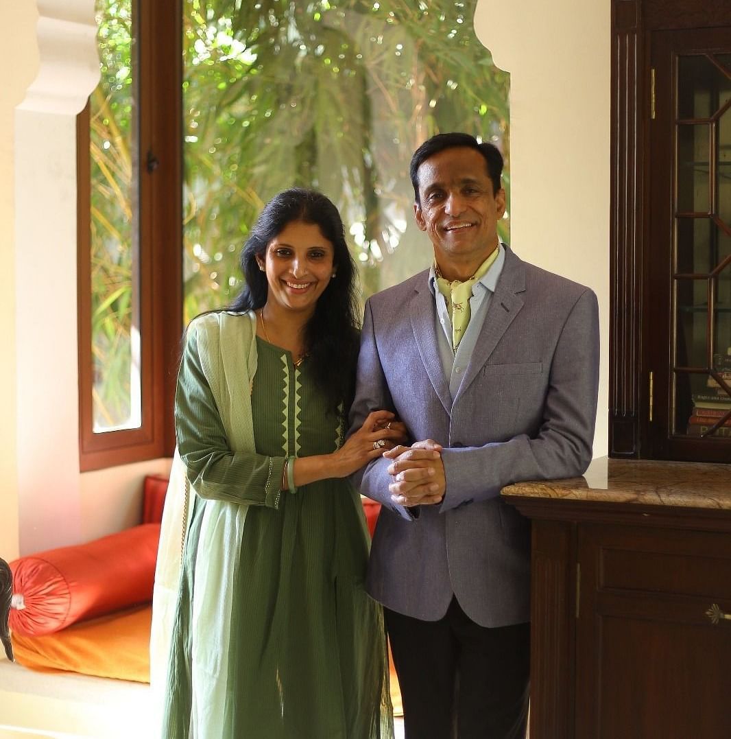 Mrs. Mandvi Ranawat & Mr. Anirudh Singh Rawatsar standing near a cabinet in one of the rooms at Dileep Kothi, Jaipur