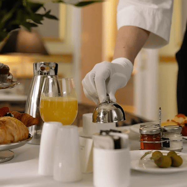 A person putting food on the table