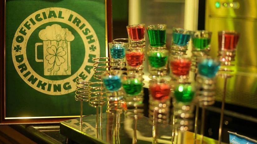 different colours of alcohol kept on the bar counter at Irish Pub