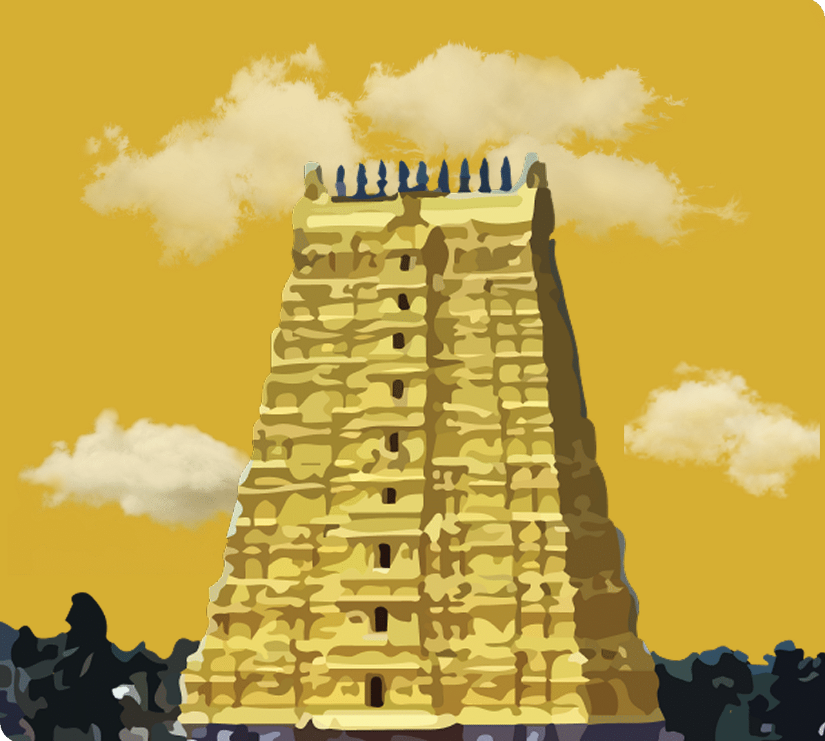 Striking yellow rajagopuram of a temple standing under golden skies.