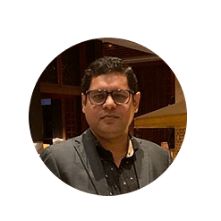 a close up image of a person - VITS Hotels & Resorts