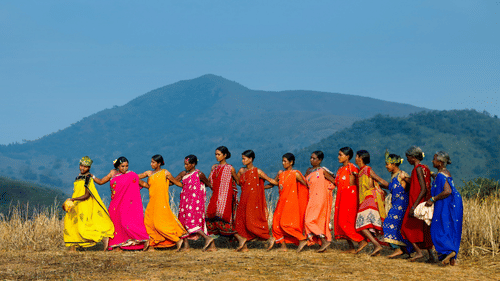 people dancing in a field