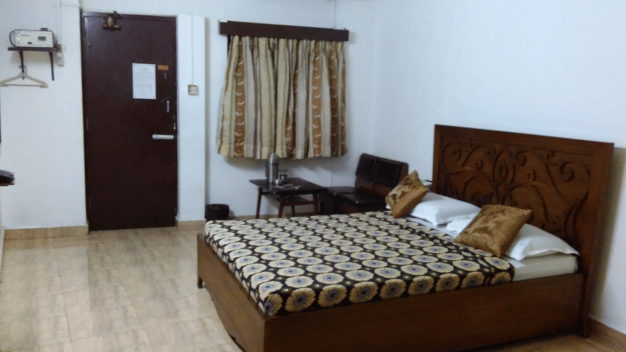 Executive Room has a work desk and an office chair in the corner near to the window