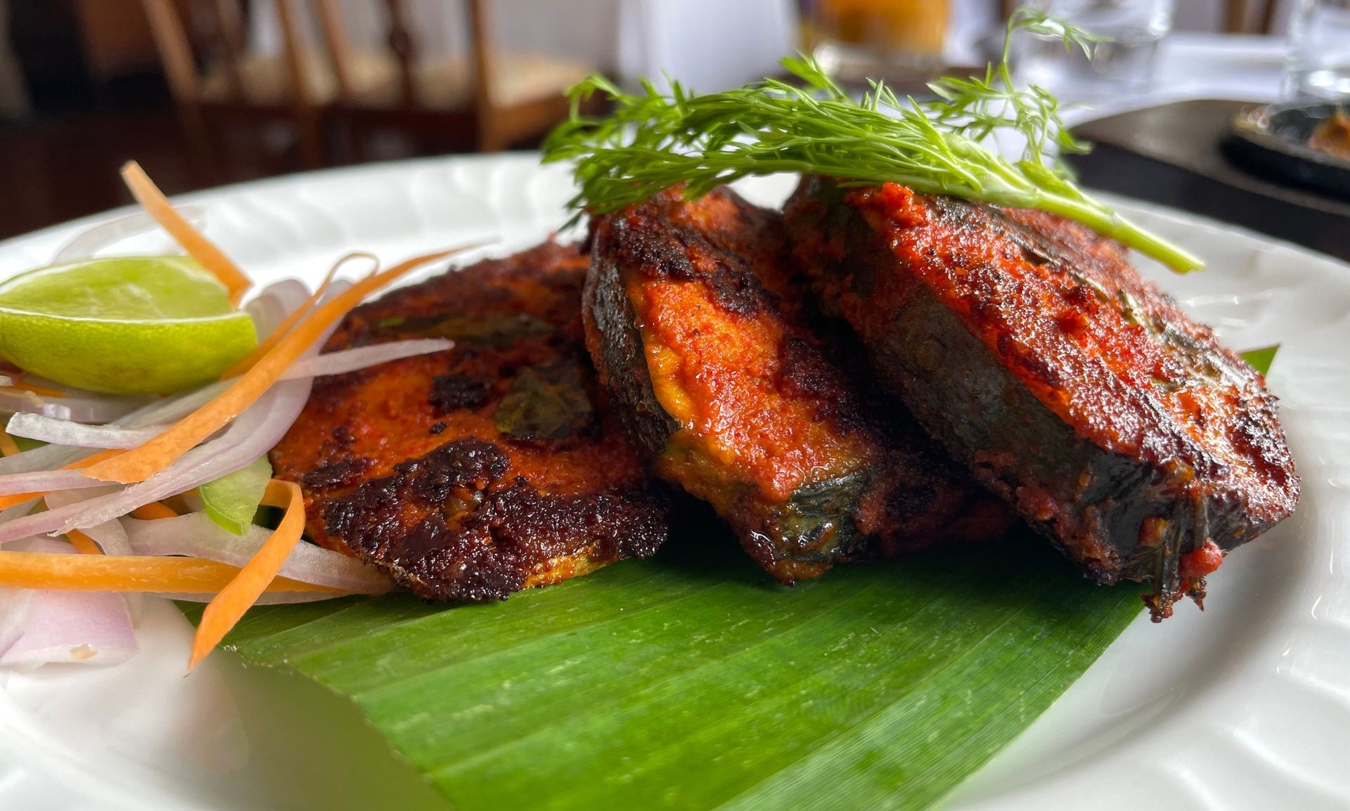 Beautifully plated Tawa-fried Seer fish Coorg dish. 5738