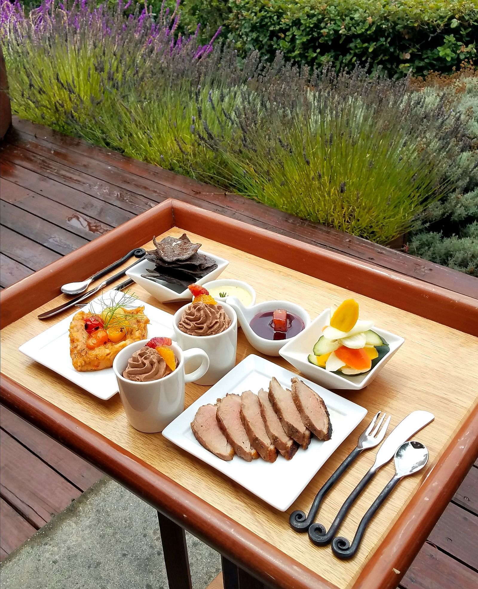 A breakfast spread on a wooden tray - Brewery Gulch Inn & Spa