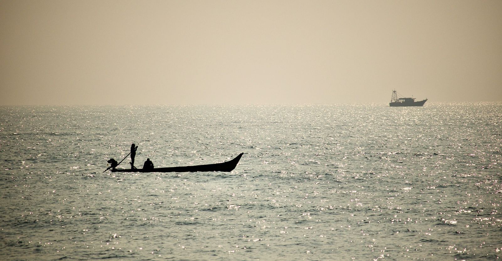 two boats out at sea during the day
