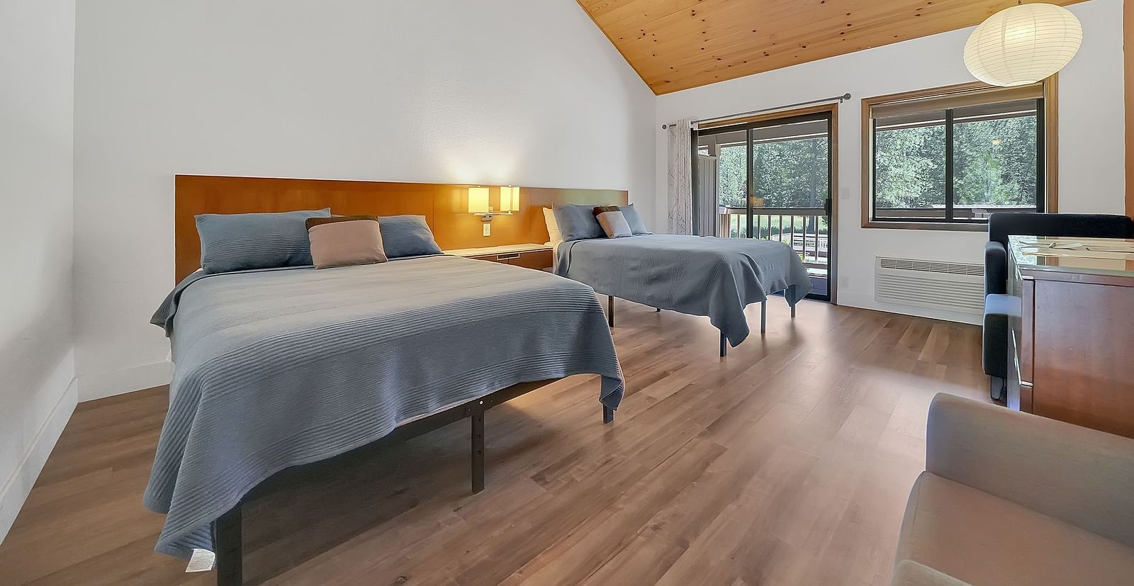 A view of a room at Amador Hotel with twin beds.