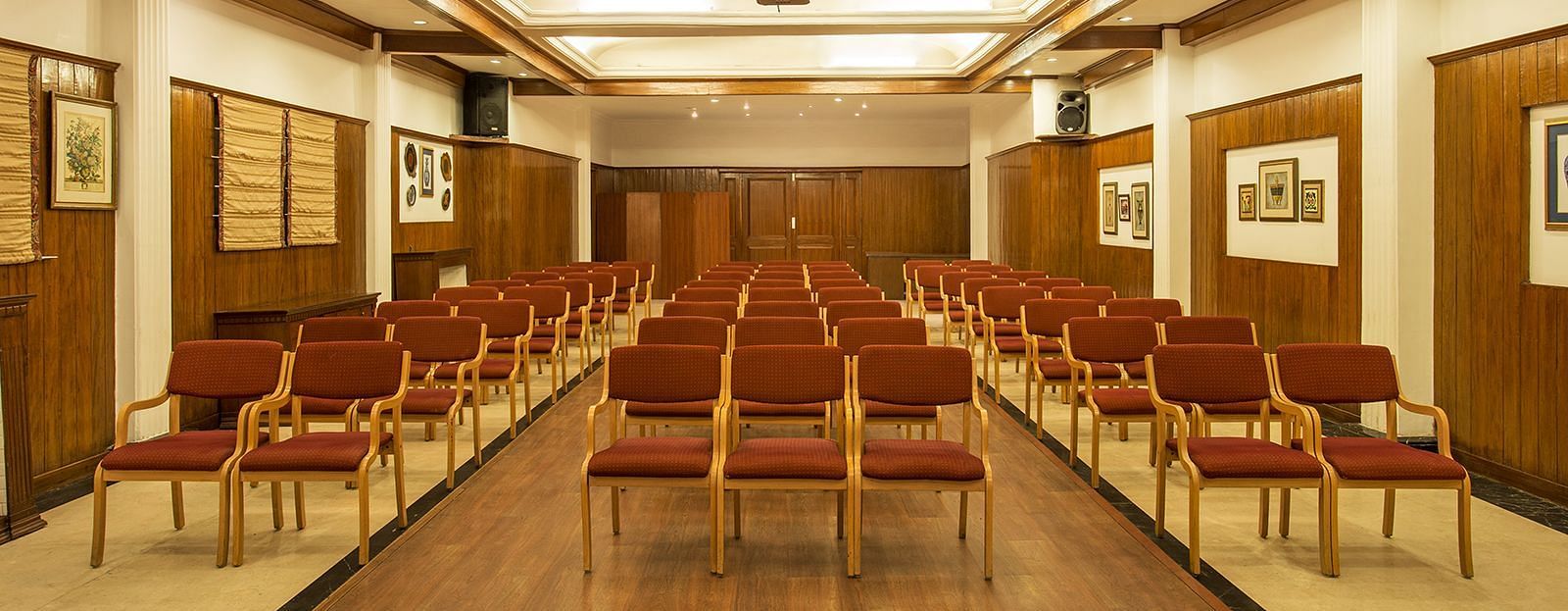 A front view of chairs placed in classroom setup in a conference room - The naini retreat, Nainital