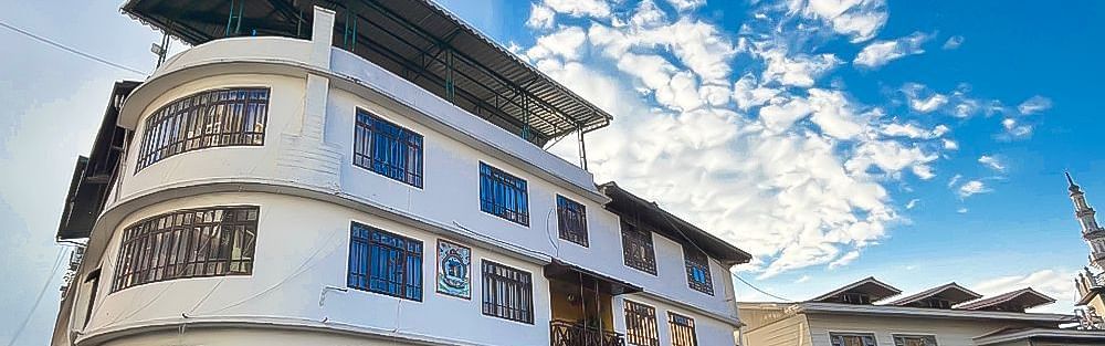 Facade view of Avianna Hungry Jack, Gangtok on a sunny day under a vibrant sky