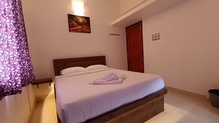 Front view of a double bed at One Bedroom Apartment at le poshe luxury