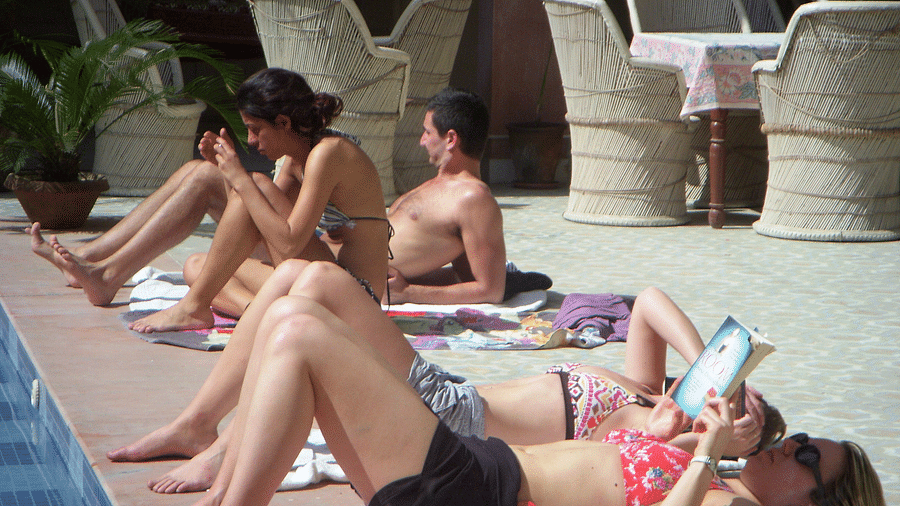 The Relaxing Splash Pool Sunbathing by the pool