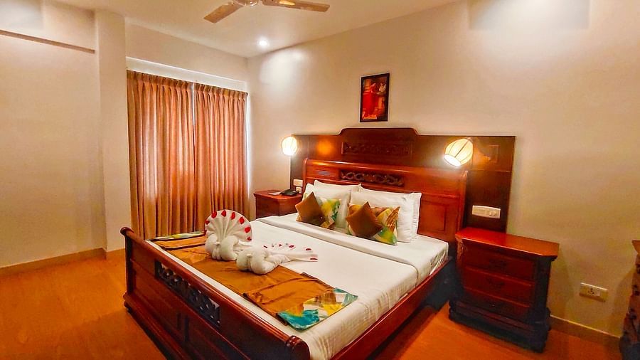 Premium Suite Bedroom with a double bed and side tables