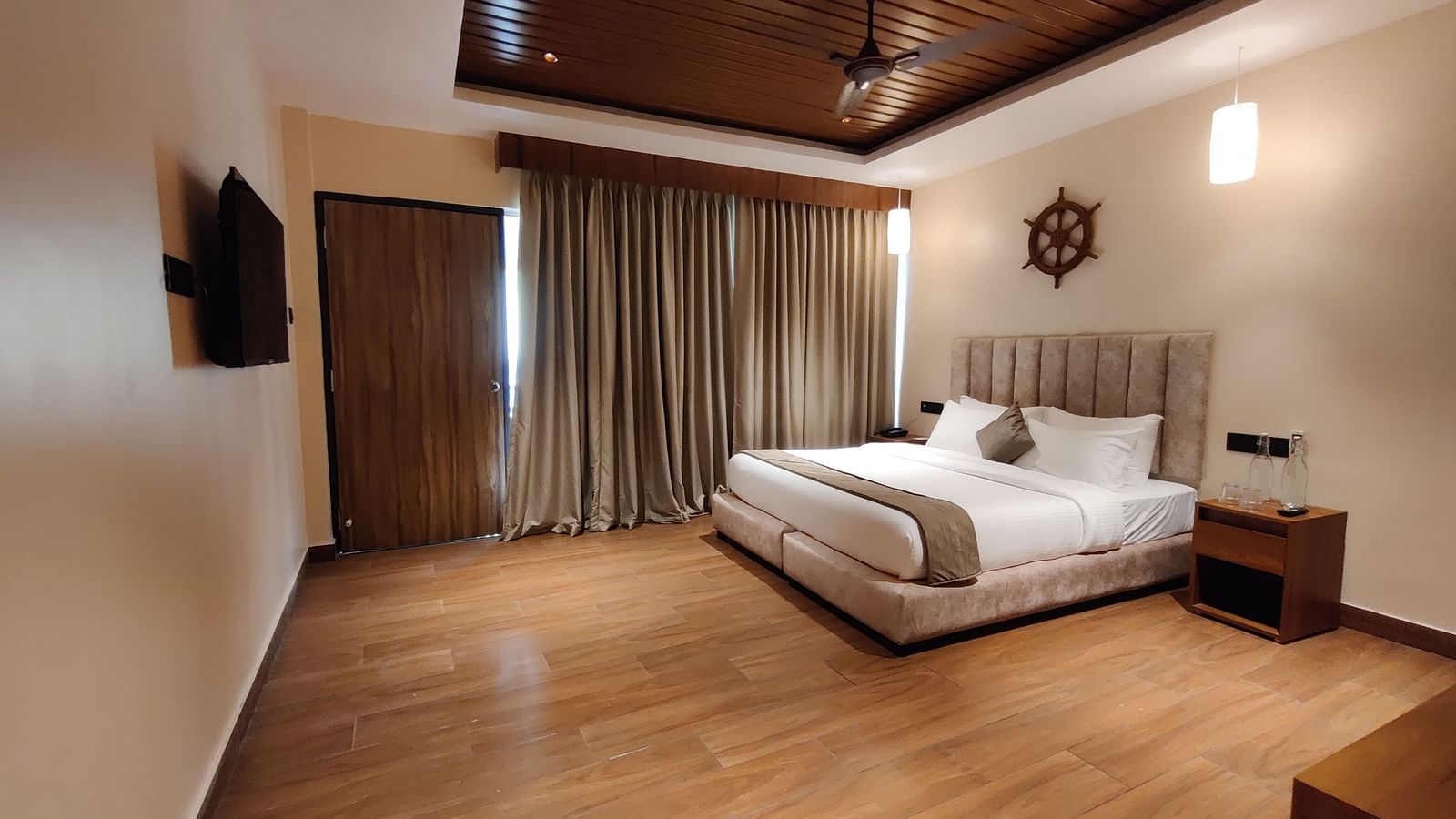 Inviting room with warm wooden tones and modern interiors - Arina Island Resort, Swaraj Dweep