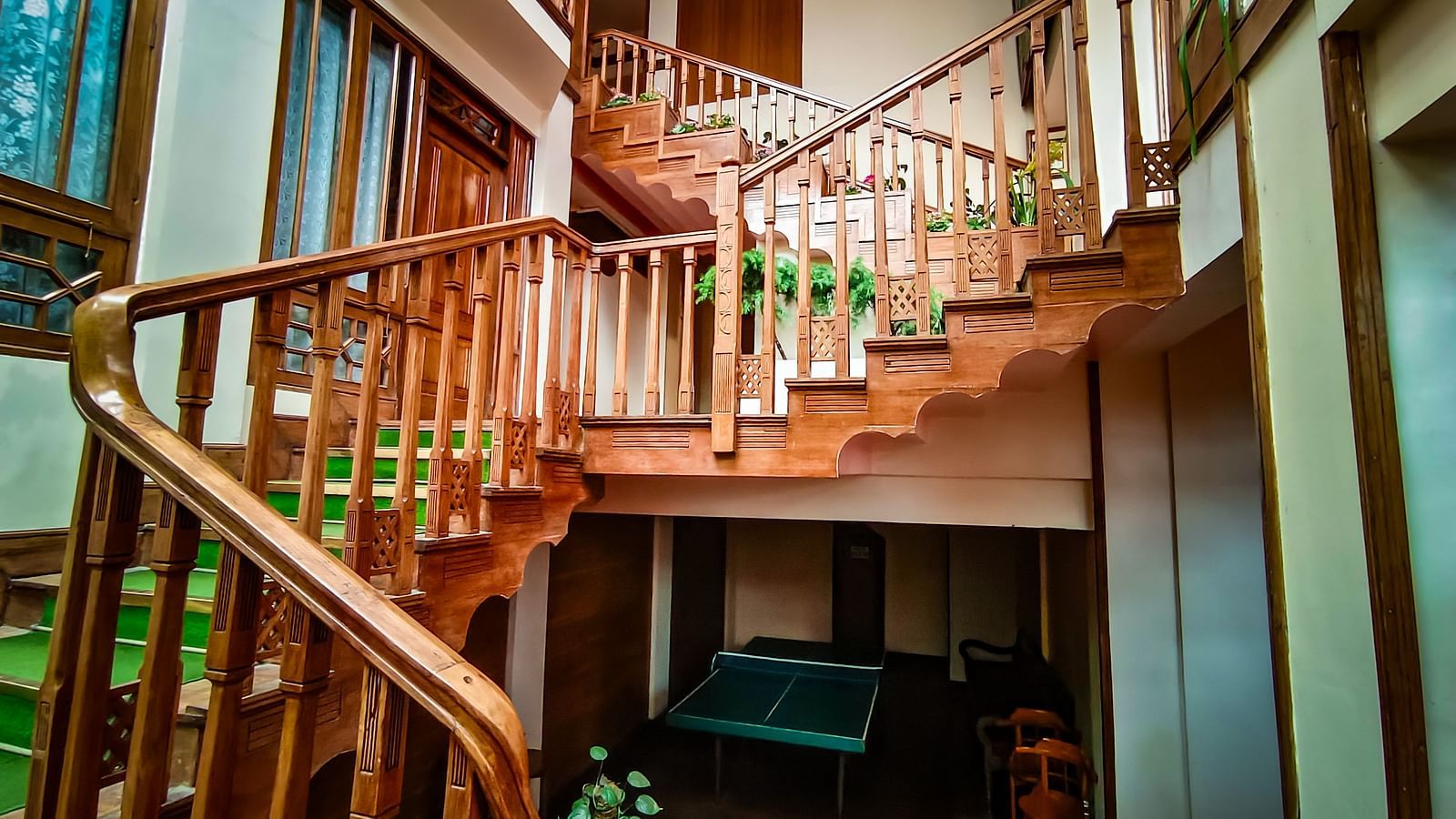 Spiral wooden staircase inside Cedar Inn