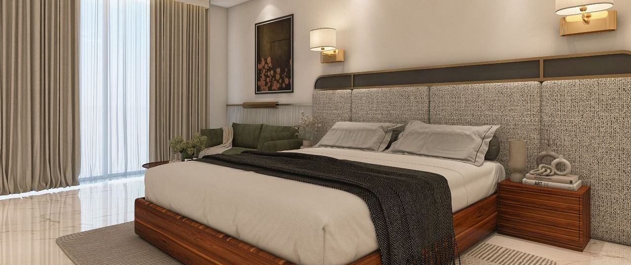 A room with modern interiors and bright lighting featuring a double bed in the middle along with two bed side tables. - Namaste Corbett