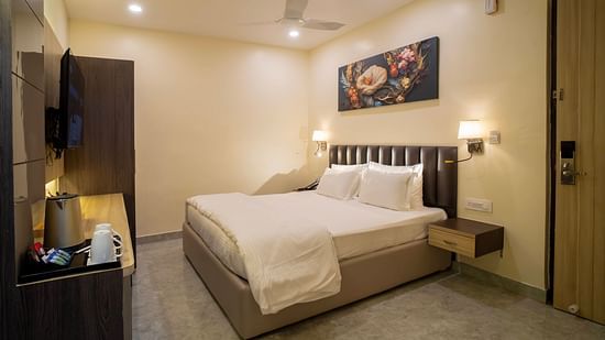 A comfy room with plushy bed at Mastiff Select Medha Plaza, Deoghar