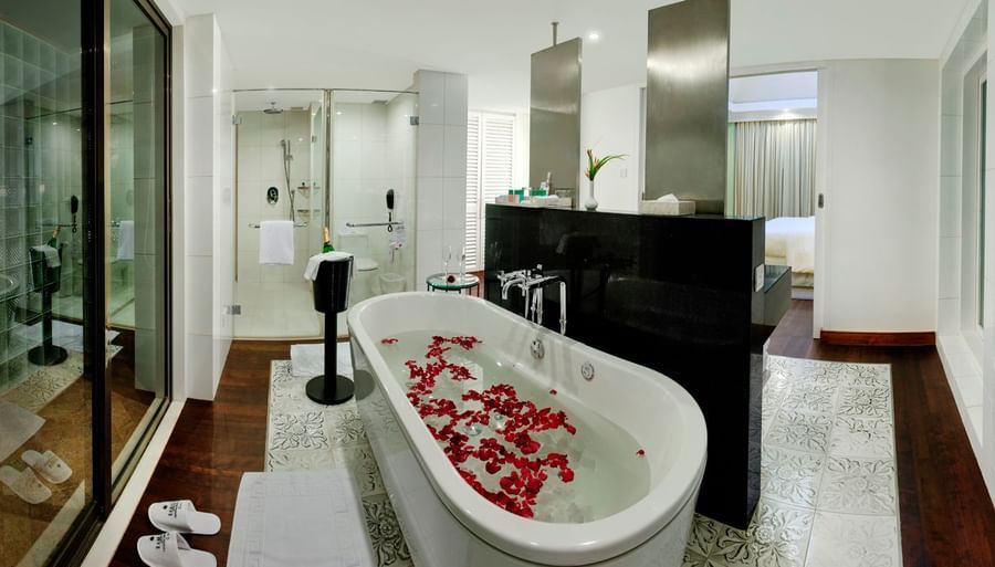 overview of the bathroom with the bathtub in view inside Presidential Villa - Caravela Beach Resort Goa