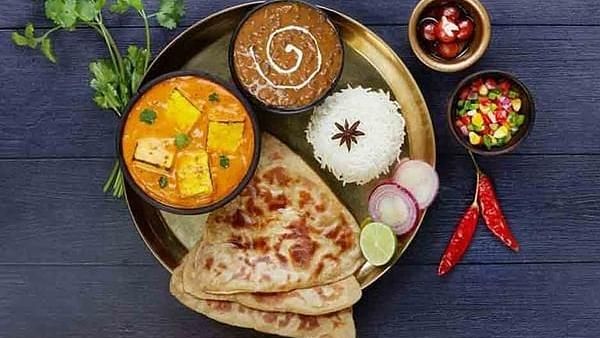 An image of a Veg Thali offered by our hotel near IIT Roorkee - Motel Divine International, Roorkee