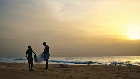 A serene sunset at the beach, with vibrant colours reflecting on the water near The Raintree, St. Mary's Road.