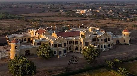 A facade image of Ambika Nivas