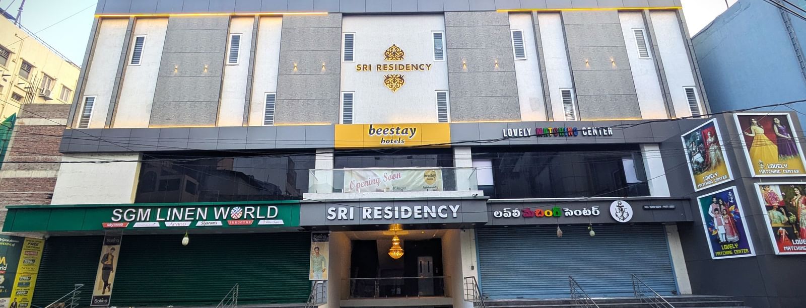 Exterior front view of Beestay Hotels with clear signage at Beestay Hotels, Rajahmundry.