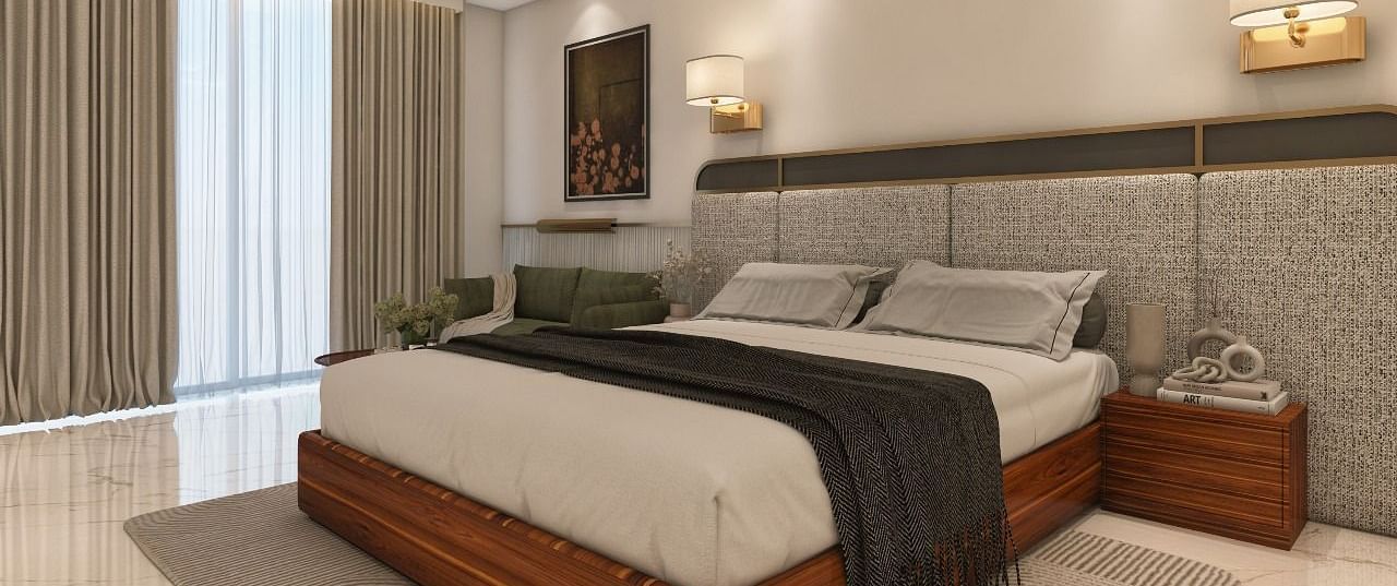A room with modern interiors and bright lighting featuring a double bed in the middle along with two bed side tables. - Namaste Corbett