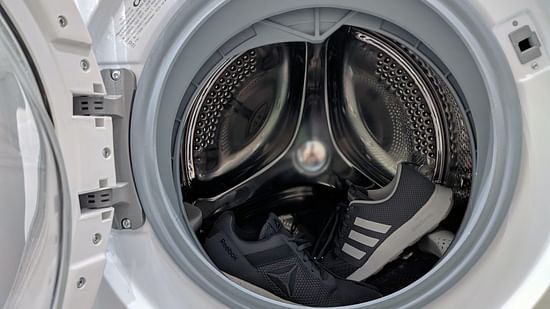 a close up shot of the inside of a washing machine