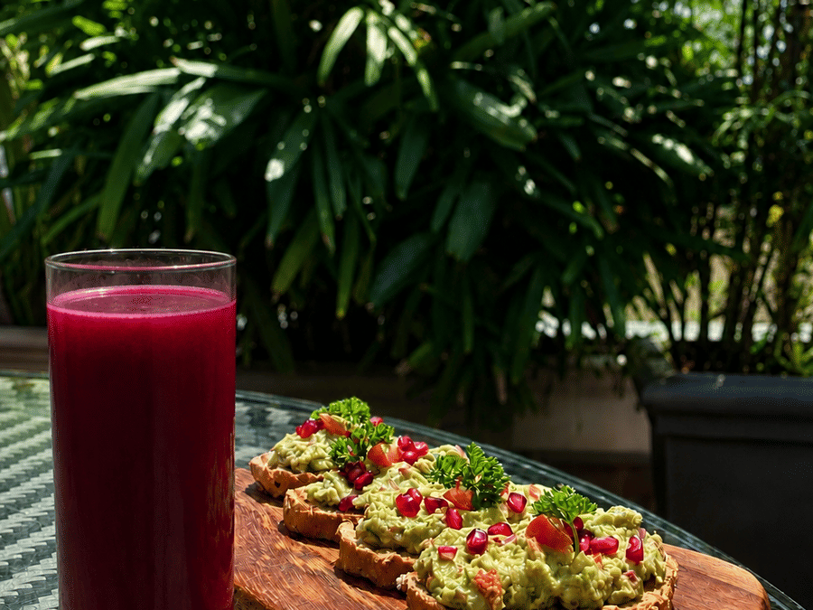 A healthy drink and snack placed on a table at Karma Lakelands.