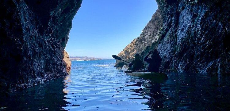 People Kayaking through a cave - Brewery Gulch Inn & Spa