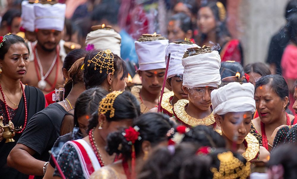 Krishna Janmashtami, Bhaktapur where are men are dressed in a traditional attire
