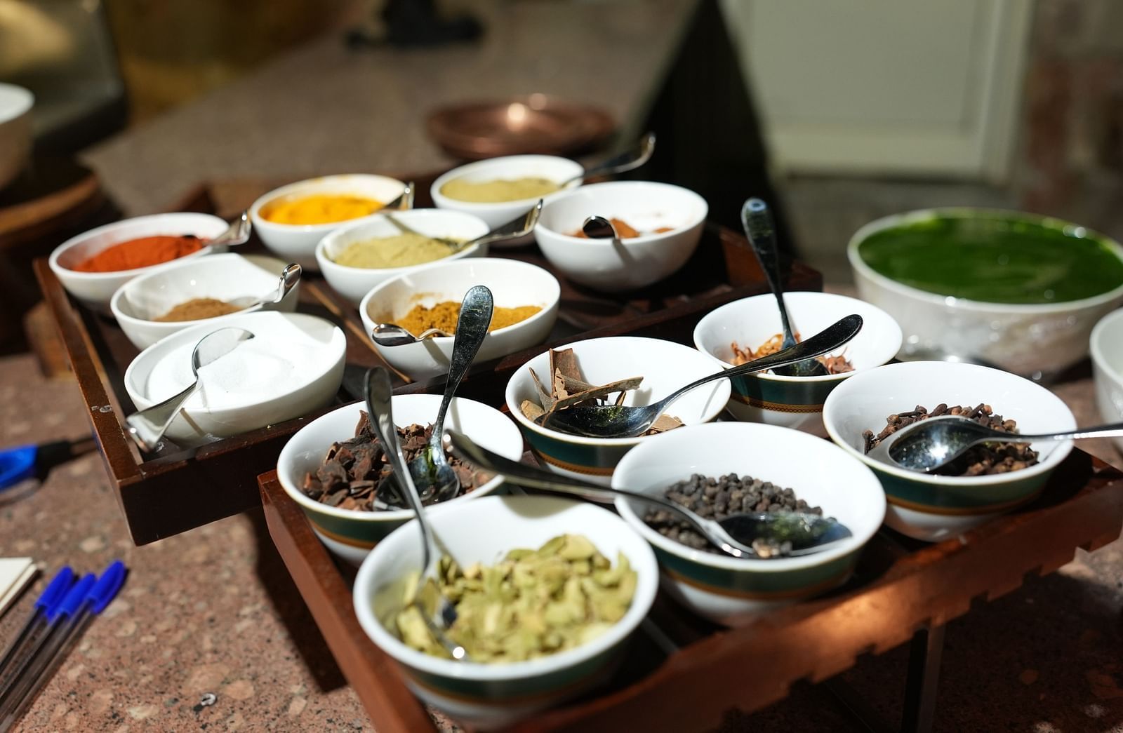 A close-up of a delightful assortment of Indian chutneys and accompaniments - Khas Bagh, Jaipur.