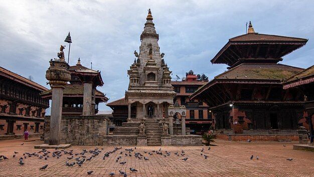 The bhaktapur durbar square with a clear sky in the background