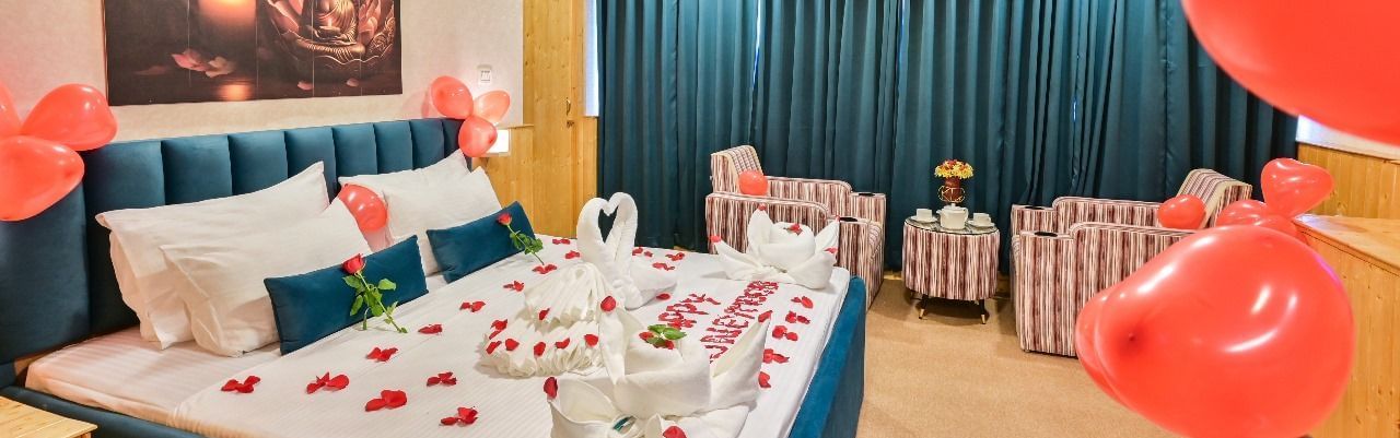 Room at Avianna Gangtok Resort and Spa decorated with flowers and balloons