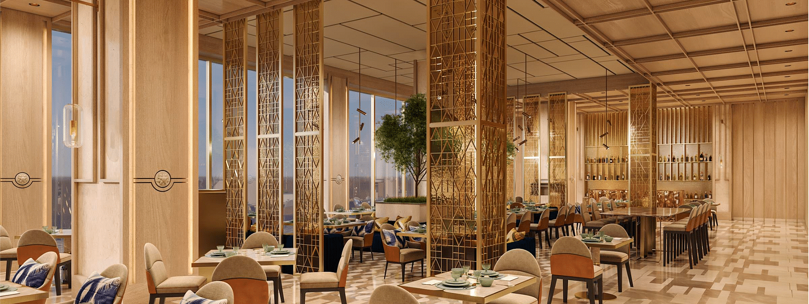 A hotel dining area with tables, chairs, modern flooring and ceilings at Merlis Hotel, Coimbatore