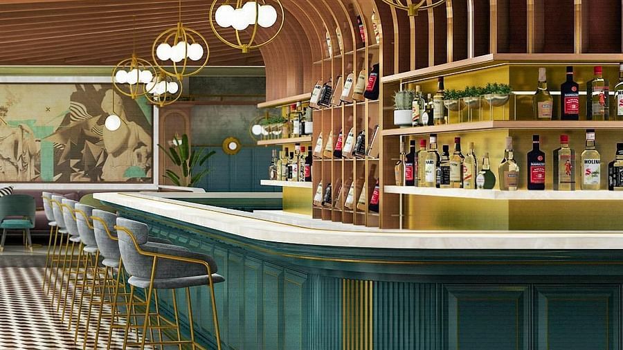 An image of a restaurant at Themis Barbecue House, Panipat featuring chairs and tables on one side and on the other there is a counter 