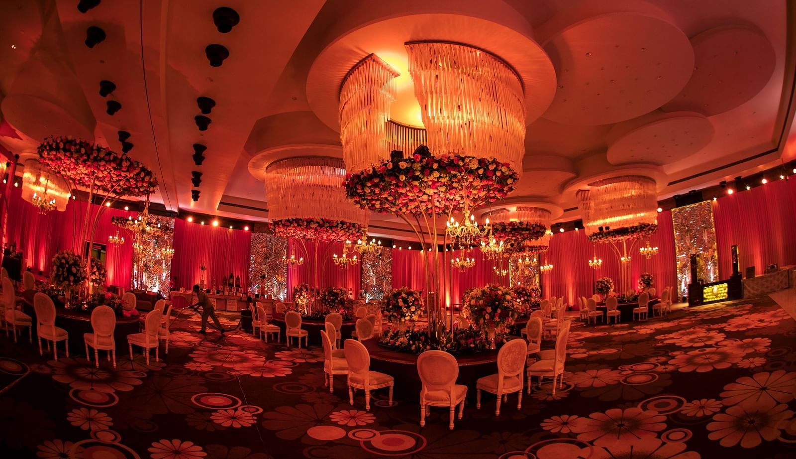 A well decorated banquet hall featuring elegant seating arrangements  - Golden Blossom Imperial Resorts, Lucknow