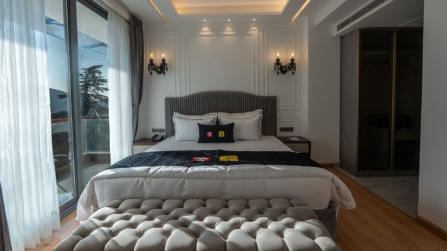 an image of a suite with  balcony space at Mastiff Select Mandavya Dharamkot, McLeodganj