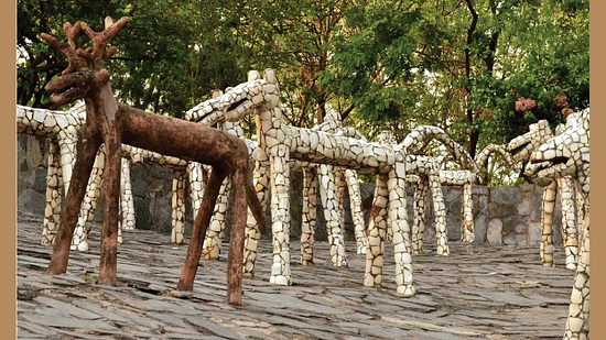 An overview of sculptures kept on a rocky area - Karma Lakelands.