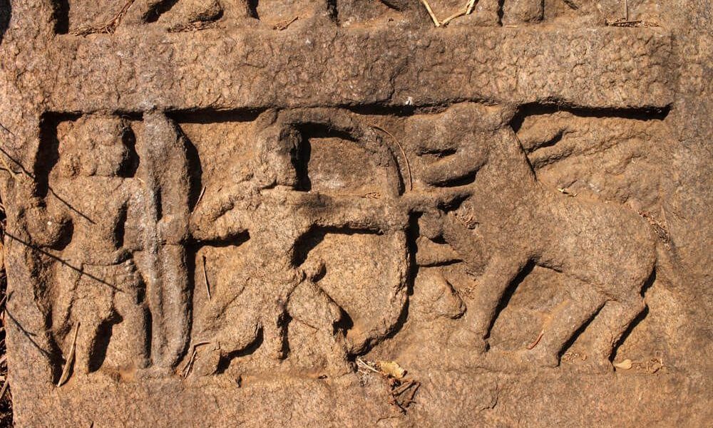 Hampi stone carving of a hunting scene.