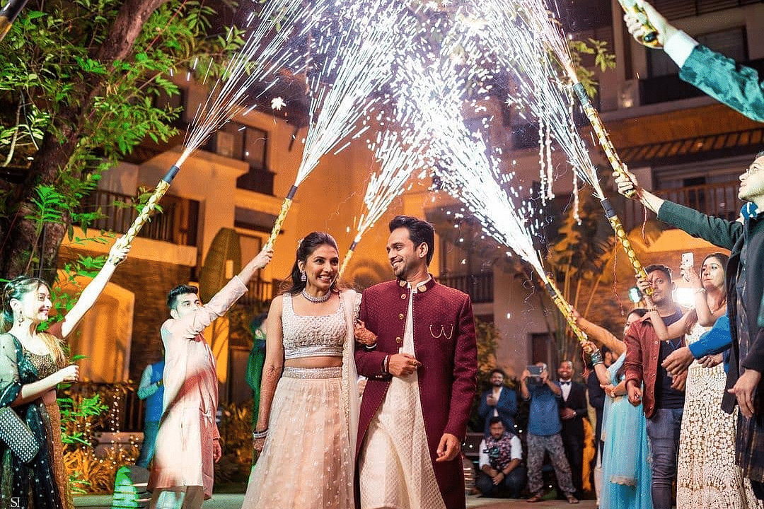 Happy couple during a wedding ceremony - Rhythm Lonavala