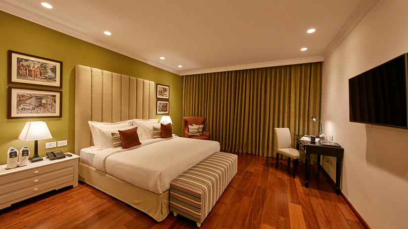 soothing interiors and a cosy bed at our hotel room in whitefield