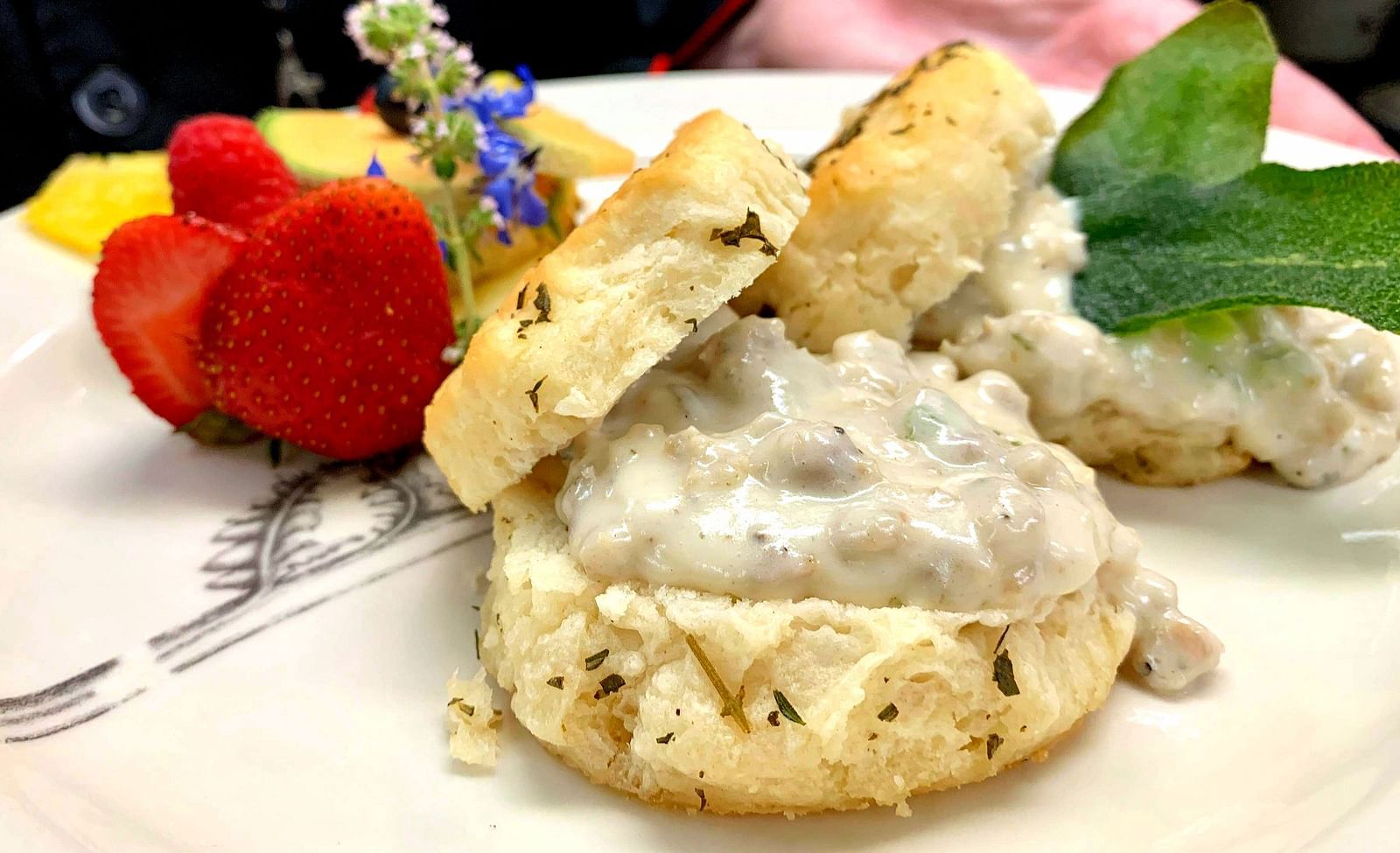 A gourmet dessert with whipped cream and fresh fruit - Brewery Gulch Inn & Spa