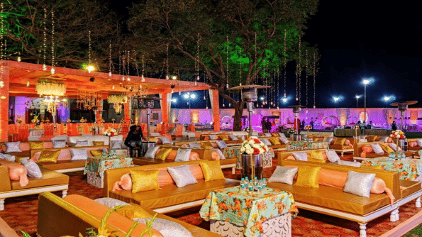 A corner view of the Front Lawn at Noor-Us-Sabah Palace featuring a traditional Indian wedding decor on the lawn.