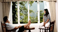 A couple relaxing in the sitting area