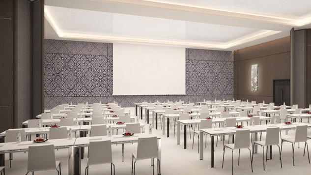 an event hall decked with rows of chairs at The Residency Towers Rameswaram