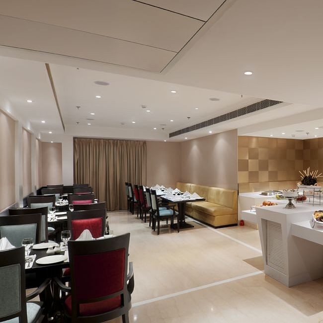 lavish seating at Cafe Inde at Inde Hotels Vista Woods, Guragon 