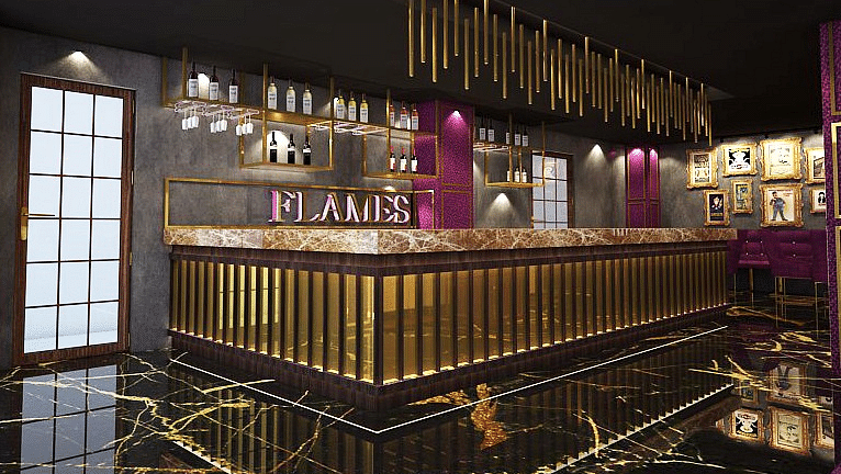 A Luxurious bar interior with a black and gold theme  - TGI Grand Fortuna, Hosur
