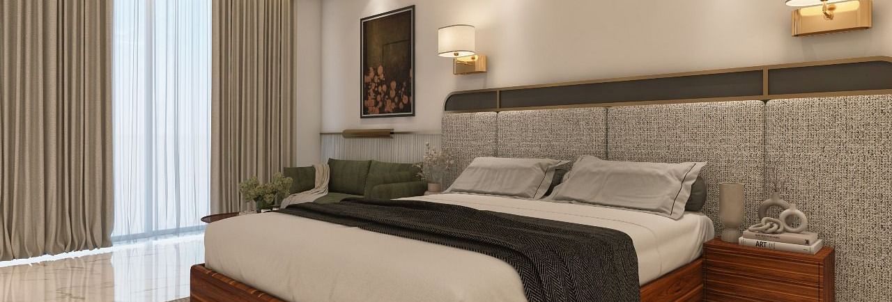 A room with modern interiors and bright lighting featuring a double bed in the middle along with two bed side tables. - Namaste Corbett